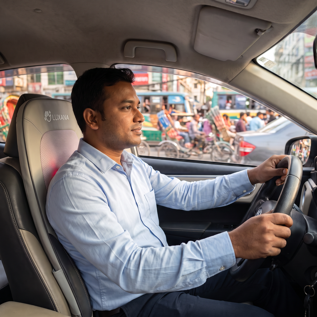 A driver in Dhaka traffic using The Sereno Drive massage seat