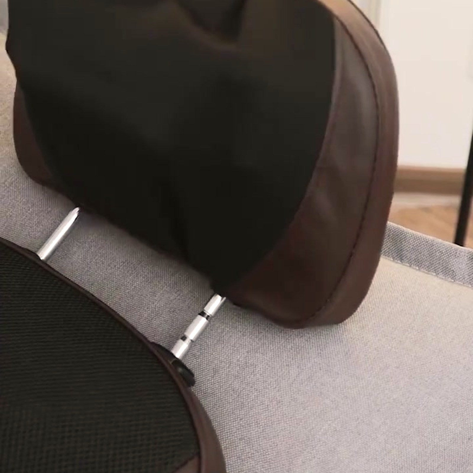 The Grande's cushioned headrest resting over a sofa back