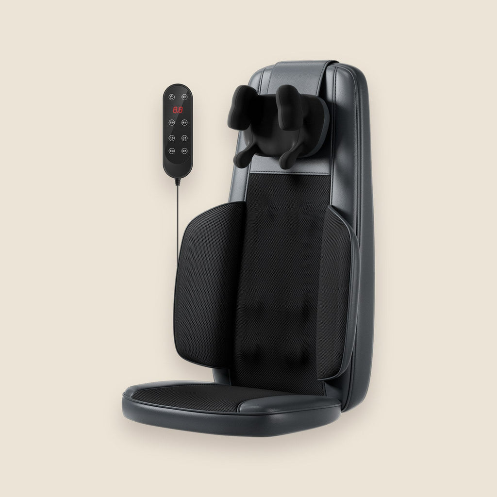 Side profile of The Notte massage cushion on a sand background