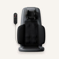 The Notte deep-knead massage cushion in noir on an ivory background