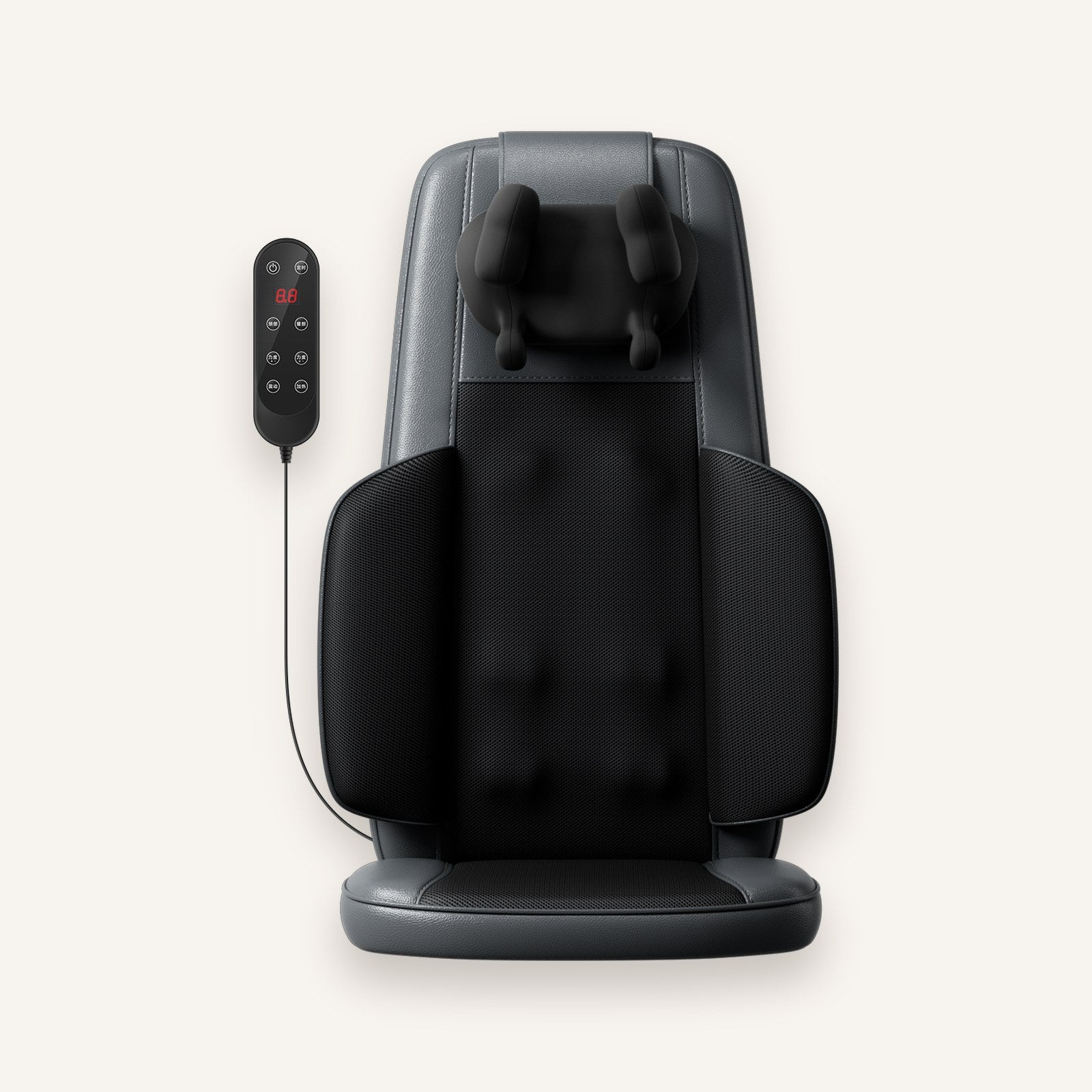 The Notte deep-knead massage cushion in noir on an ivory background