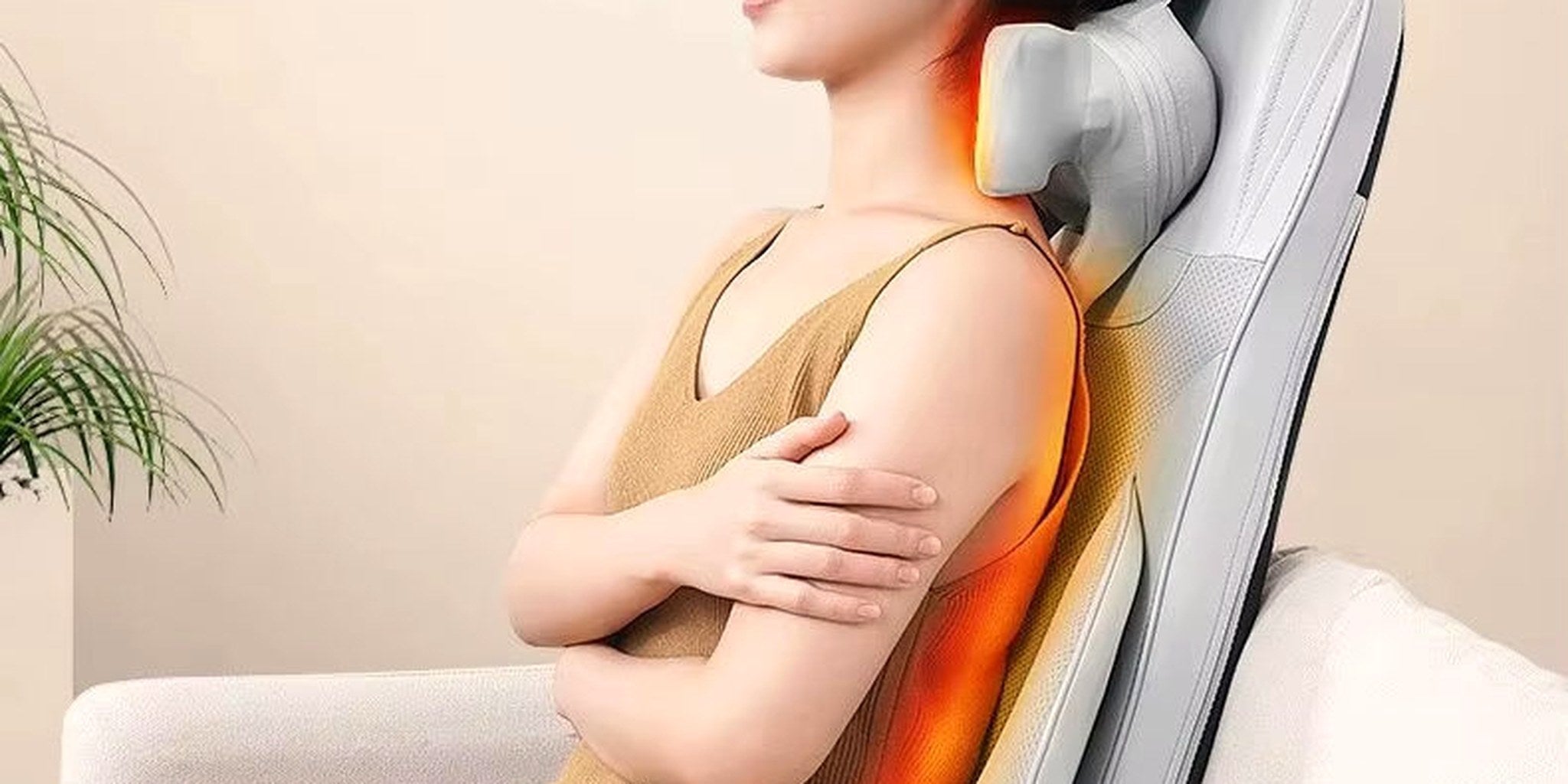 The Sereno massage seat in a warm, softly lit living room