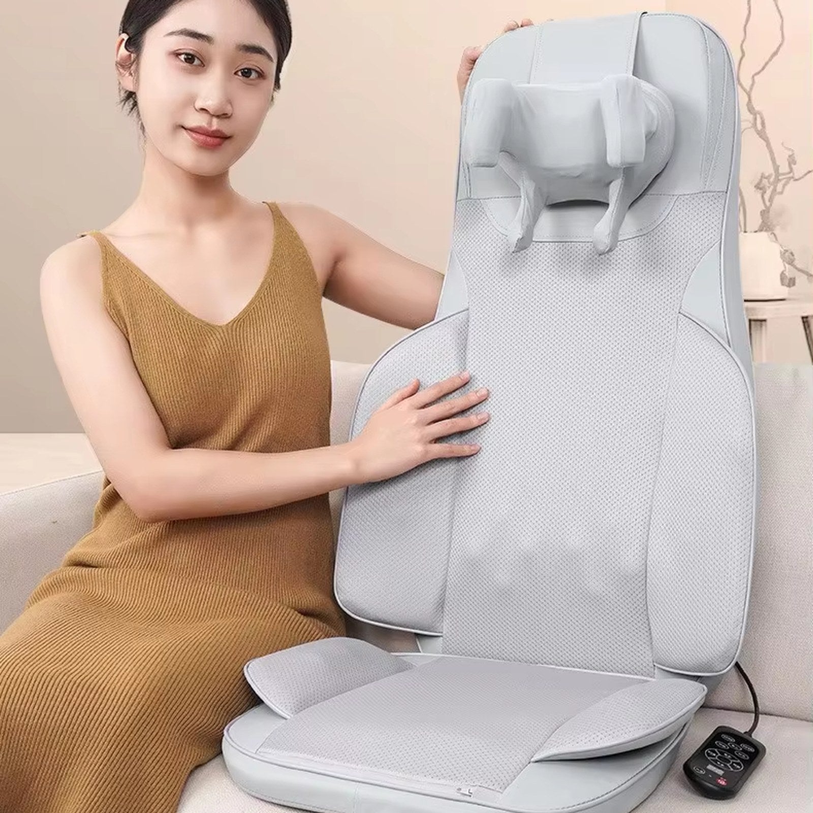 The Sereno held upright showing the full seat and neck massage unit